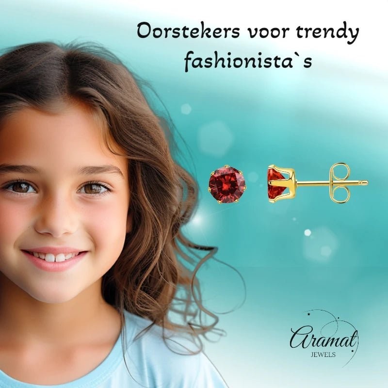Aramat Jewels oorstekers van goudkleurig RVS met rode zirkonia, 3 mm diameter, subtiel en elegant.