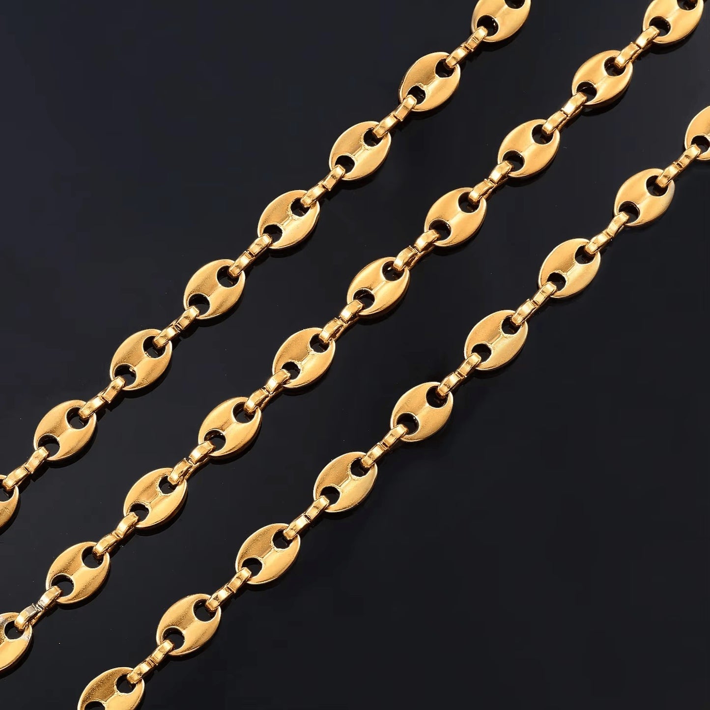Aramat Jewels goudkleurige stalen koffieboon ketting van 5,2mm breed en 60cm lang met een luxe mariner schakelontwerp.