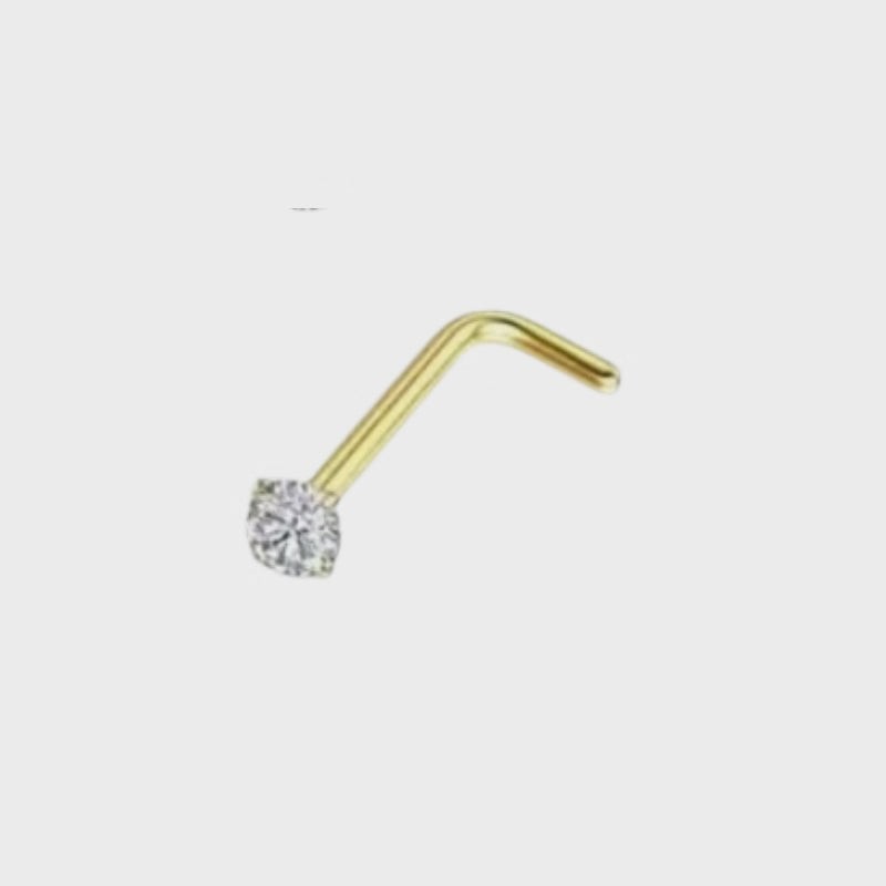 Aramat Jewels goudkleurige neuspiercing met L-staafje van chirurgisch staal en een transparante ronde zirkonia steen.
