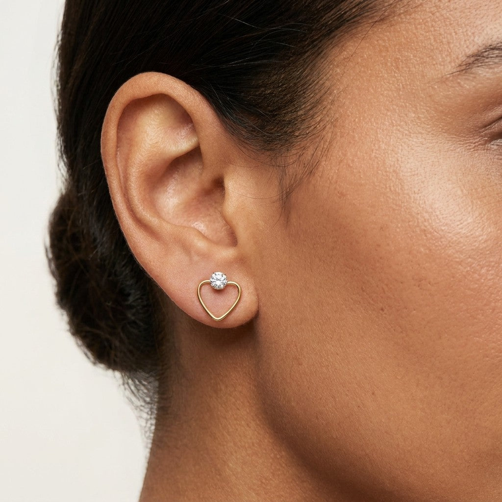 Aramat Jewels goudkleurige stalen hart oorbellen 10mm met zirkonia steen, open design.