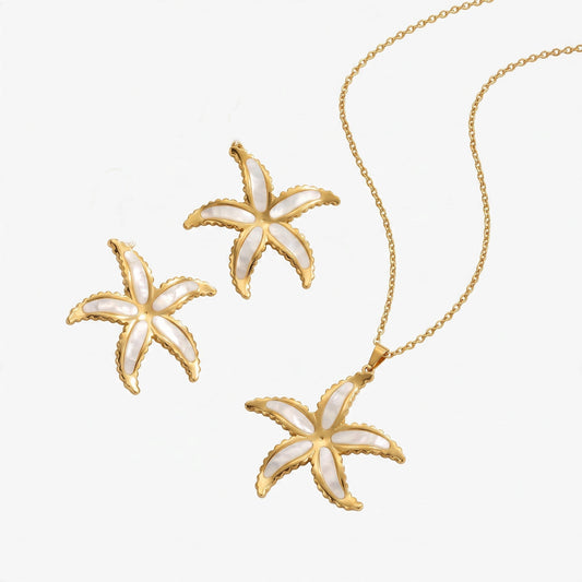 Aramat Jewels goudkleurige RVS sieradenset met zeesterhanger en bijpassende oorbellen met wit emaille