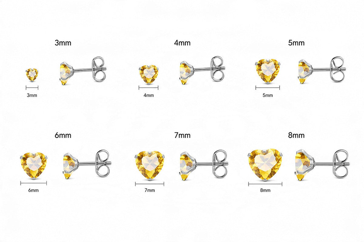 Aramat Jewels hartjes oorstekers van RVS met gele zirkonia in verschillende maten van 3 tot 8 mm.