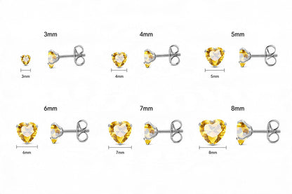 Aramat Jewels hartjes oorstekers van RVS met gele zirkonia in verschillende maten van 3 tot 8 mm.