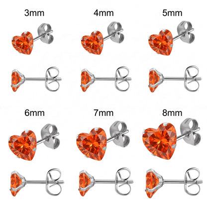 Aramat Jewels hartjes oorstekers van zilverkleurig RVS met oranje zirkonia in zes verschillende maten van 3 tot 8mm.