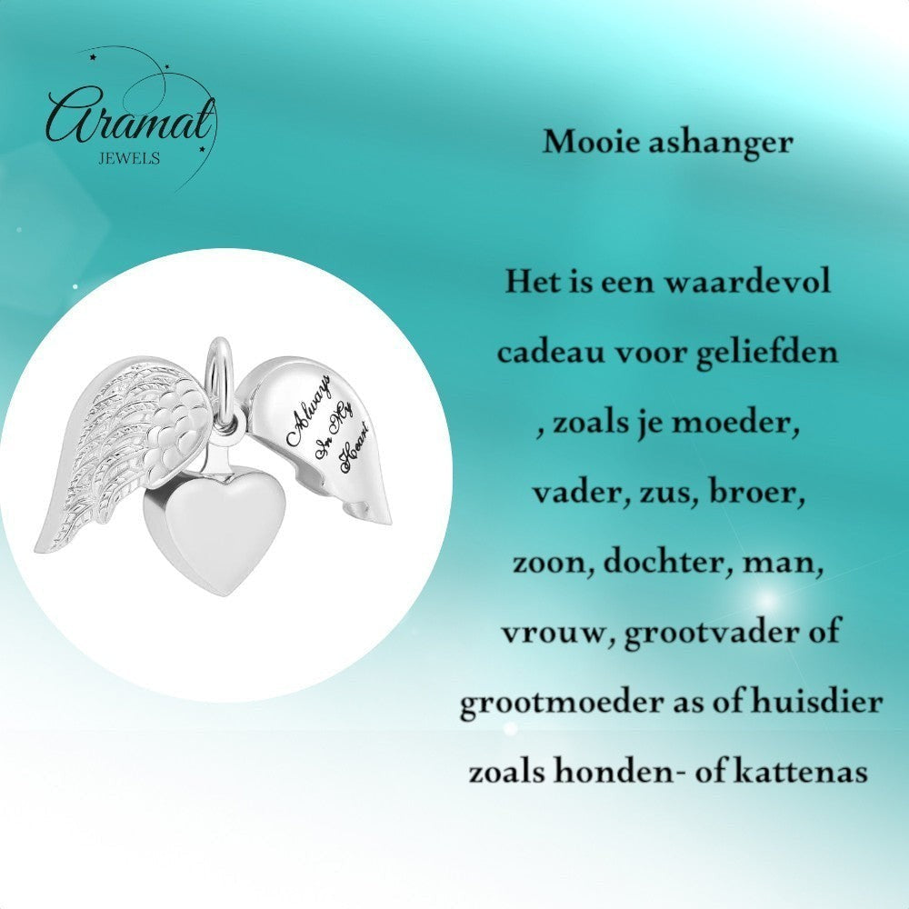 Aramat Jewels silver-tone stainless steel heart ash pendant with movable angel wings, inscribed 'Always In My Heart'.
