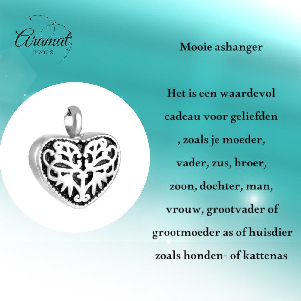 Aramat Jewels silver-coloured steel heart-shaped cremation pendant with black enamel filigree detail.