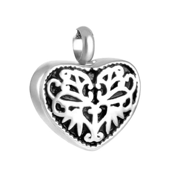 Aramat Jewels silver-tone stainless steel heart-shaped cremation urn pendant with black enamel filigree detail.