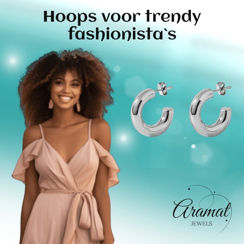 Aramat Jewels massieve zilverkleurige halve oorringen van RVS, 25x8mm, glad design.