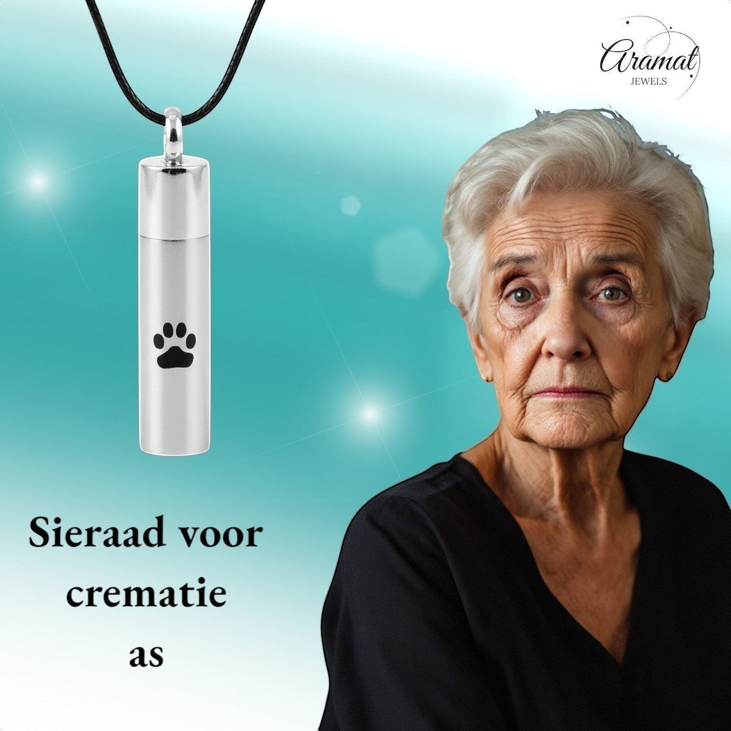 Aramat Jewels matte silver stainless steel cremation urn pendant with black paw print design, 46mm tube shape.