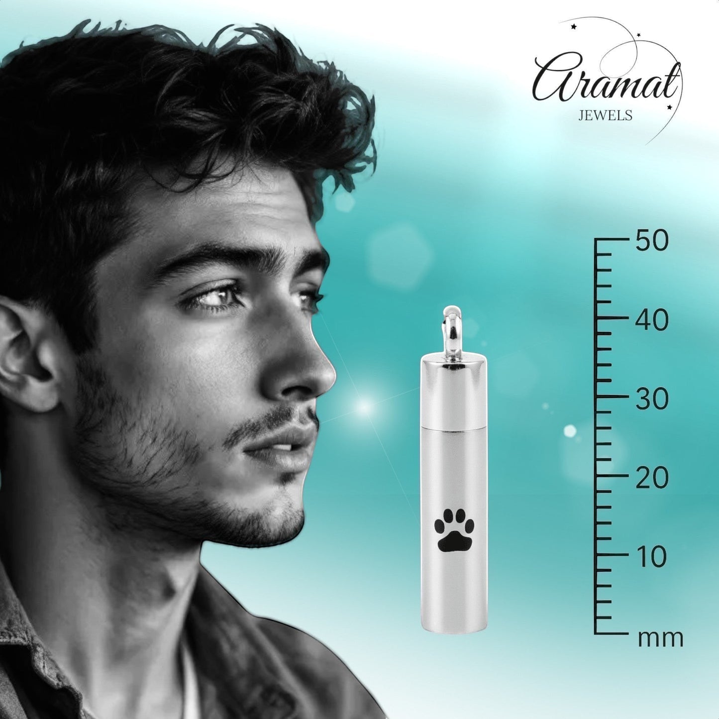 Aramat Jewels matte silver stainless steel cremation urn pendant with black paw print design, 46mm tall.