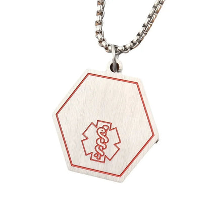 Aramat Jewels zeshoekige medische hanger van roestvrij staal met rode Staf van Aesculapius en bijpassende ketting.