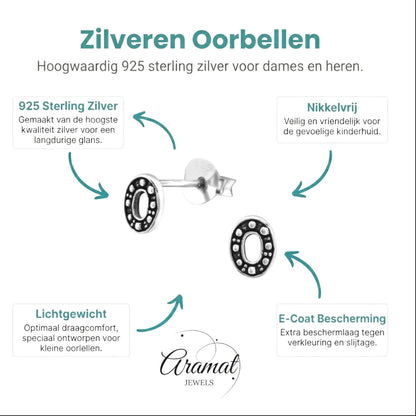 Aramat Jewels 925 sterling silver oval stud earrings with Bali-style beaded pattern and dark oxidized finish