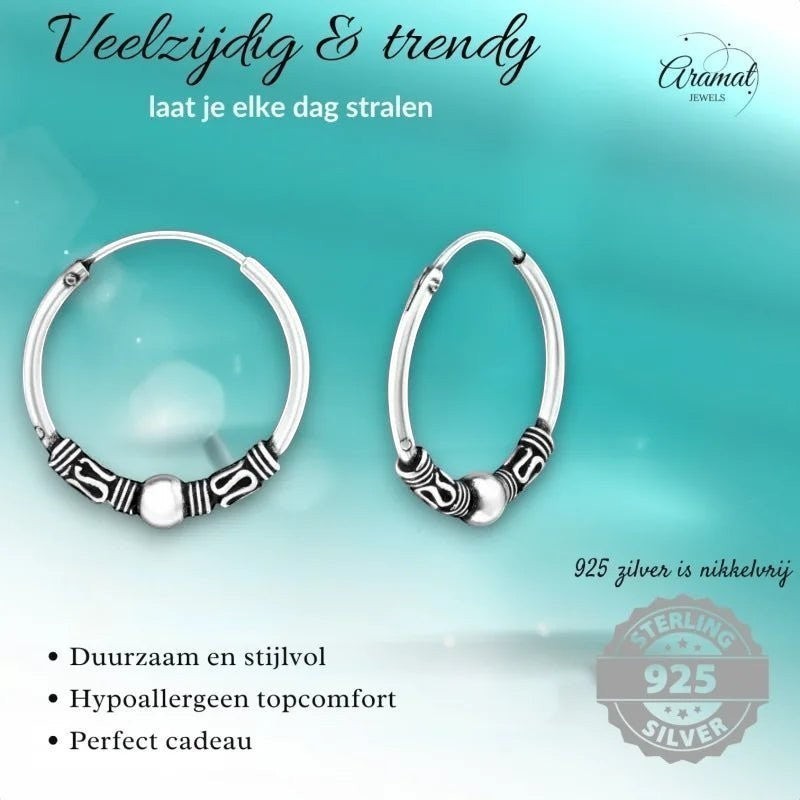Aramat Jewels 18mm oxidized silver hoop earrings with ethnic Bali design. Hypoallergenic and durable.