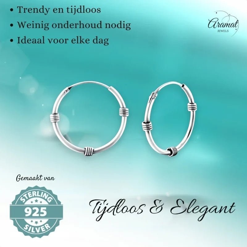 Aramat Jewels pair of 20mm oxidized sterling silver Bali hoop earrings with textured detailing. Timeless and elegant.