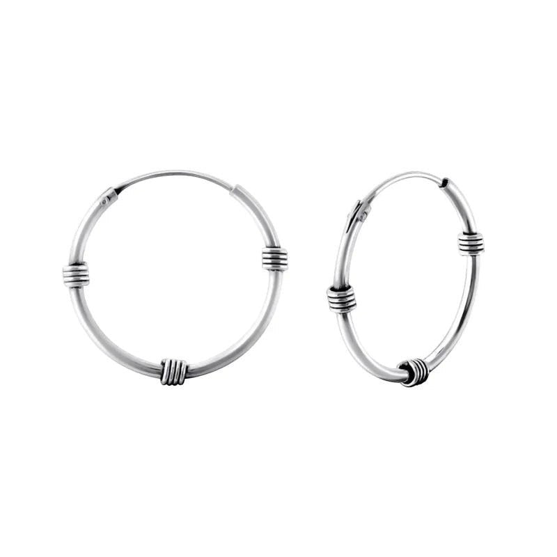 Aramat Jewels oxidized silver Bali hoop earrings, 20mm diameter, with textured detailing.