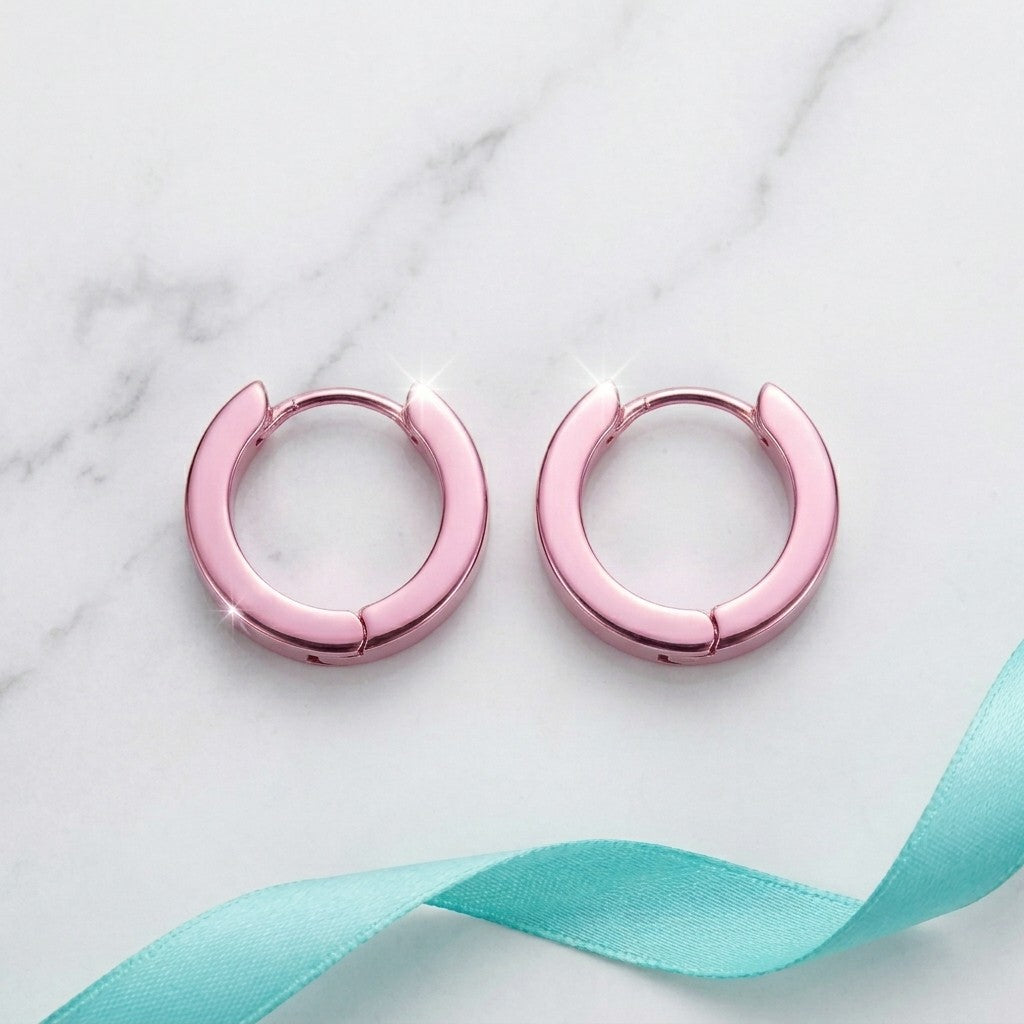 Aramat Jewels small pink stainless steel hoop earrings with a shiny finish, 14mm diameter.