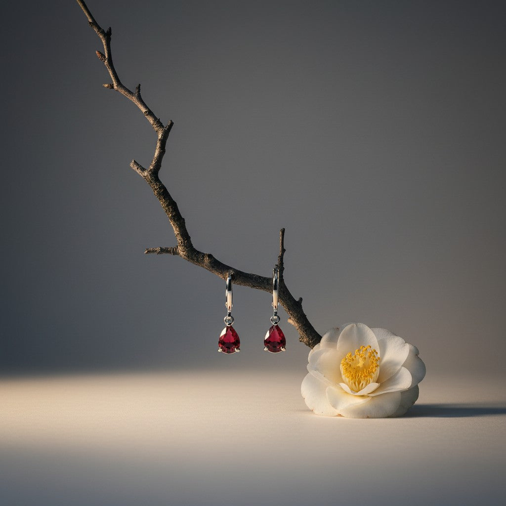 Aramat Jewels mini silver hoop earrings with red teardrop zirconia charms for girls.