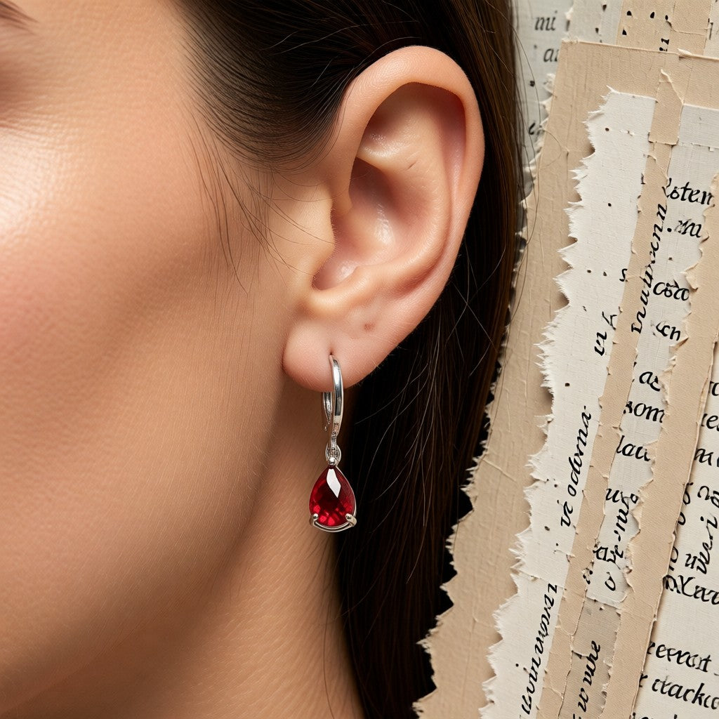 Aramat Jewels mini silver hoop earrings with a red teardrop zirconia stone, perfect for girls.