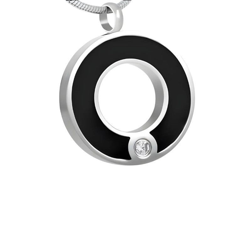Aramat Jewels ronde zwarte stalen ashanger met een schroefsluiting en een klein steentje.