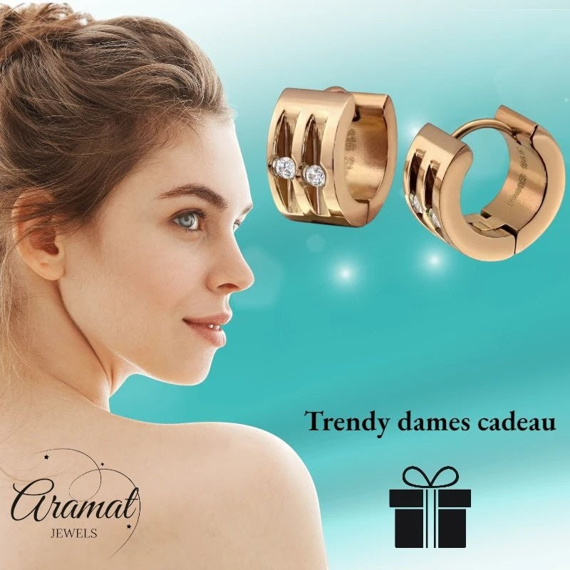Aramat Jewels rose gold stainless steel huggie earrings with two clear cubic zirconia stones.