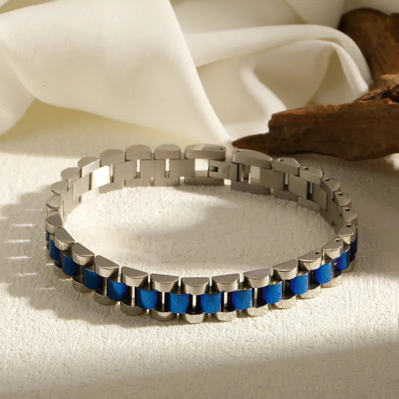 Aramat Jewels RVS schakelarmband in bicolor blauw en zilverkleurig met een horlogeband design van 10 mm breed.