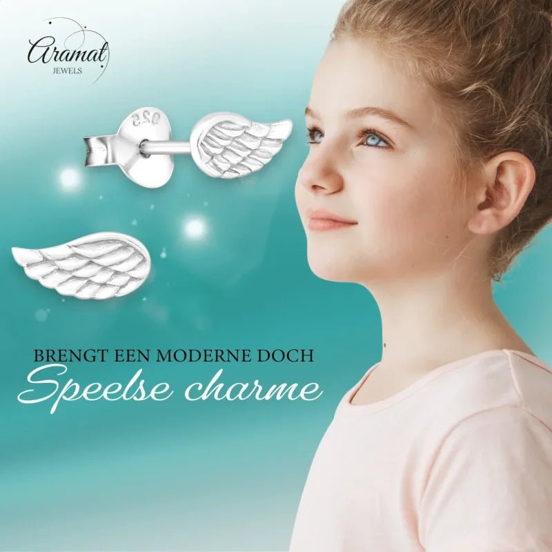 Aramat Jewels 925 sterling silver angel wing stud earrings with engraved feather details worn by a young girl