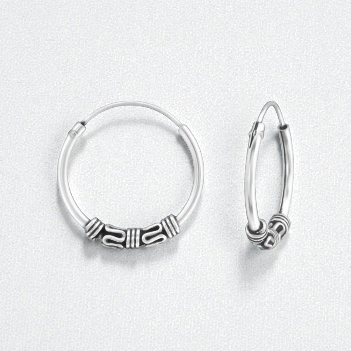 Aramat Jewels unisex silver Bali hoop earrings, 16mm diameter, with intricate tribal bead details.