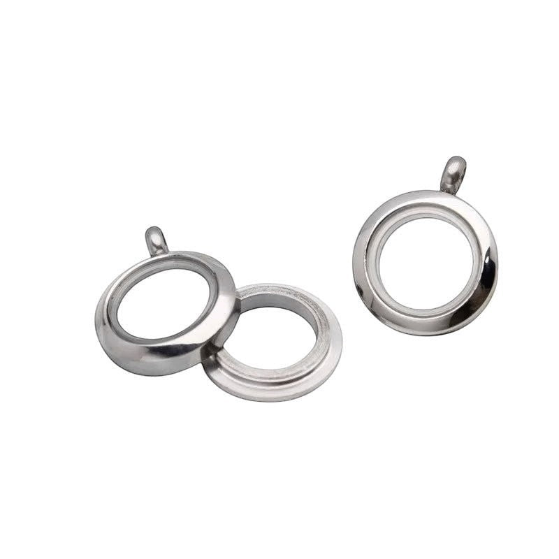 Aramat Jewels small round silver-colored stainless steel cremation pendant, 15mm, with screw closure. Discreet memorial jewelry.