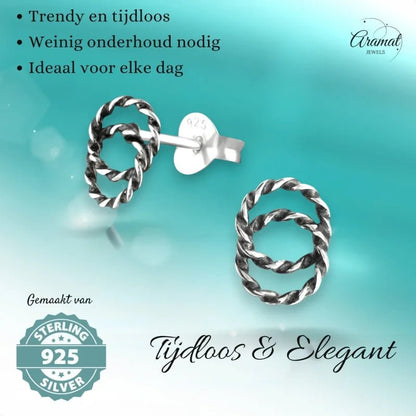 Aramat Jewels 925 sterling silver double circle stud earrings with a twisted rope design and dark oxidized finish.