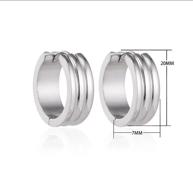 Aramat Jewels wide silver-tone stainless steel hoop earrings with subtle stripe detailing, 13mm diameter and 7mm width.