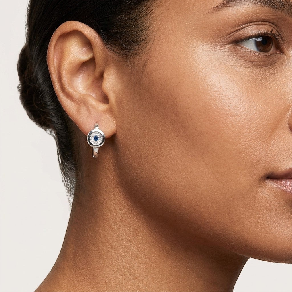 Aramat Jewels silver hoop earrings with blue and clear cubic zirconia, 12mm diameter.