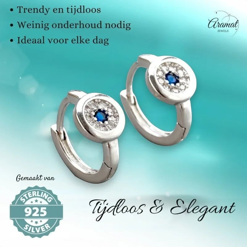 Aramat Jewels sterling silver hoop earrings with blue and clear cubic zirconia, 12mm diameter.