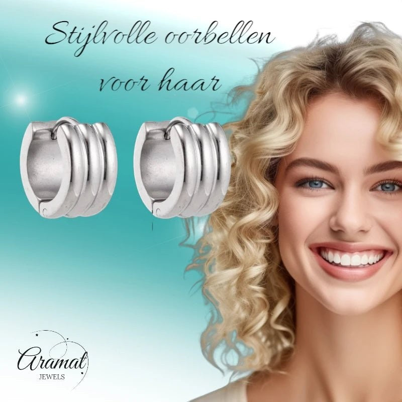 Aramat Jewels wide silver-tone stainless steel hoop earrings with ribbed detail, 13x7mm.