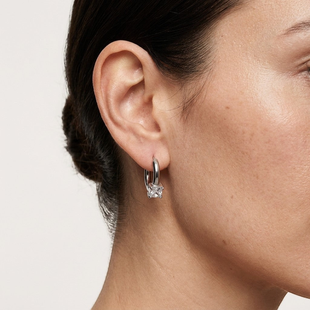 Aramat Jewels silver-tone hoop earrings with a 4.5mm square clear cubic zirconia stone.