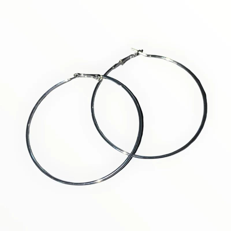 Aramat Jewels silver-tone stainless steel hoop earrings, classic design, high gloss finish, available in multiple sizes.