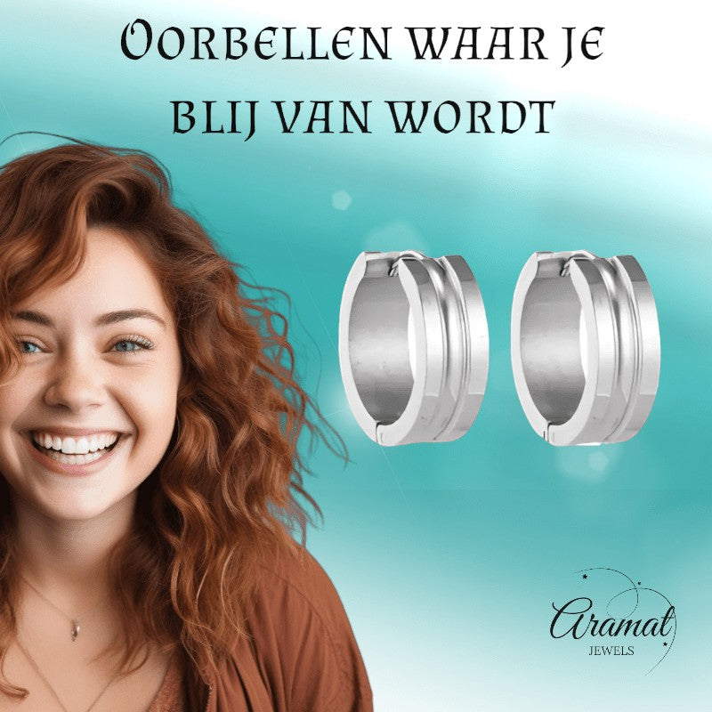 Aramat Jewels silver-colored stainless steel hoop earrings with dynamic stripe design, 19mm diameter, 7mm width, and a polished finish.