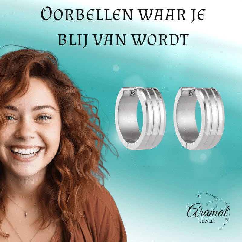Aramat Jewels silver-tone stainless steel hoop earrings with three raised stripes, 20mm diameter.