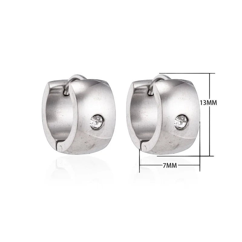 Aramat Jewels silver-coloured wide stainless steel hoop earrings with a clear cubic zirconia stone. Diameter 13mm, width 7mm.