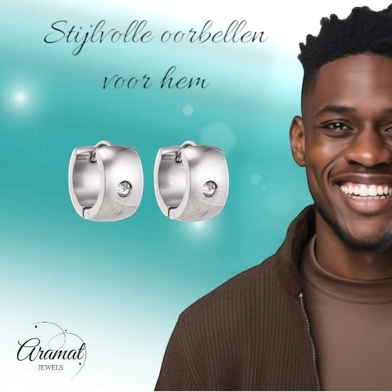 Aramat Jewels silver-colored wide stainless steel hoop earrings with a clear cubic zirconia stone, unisex design.