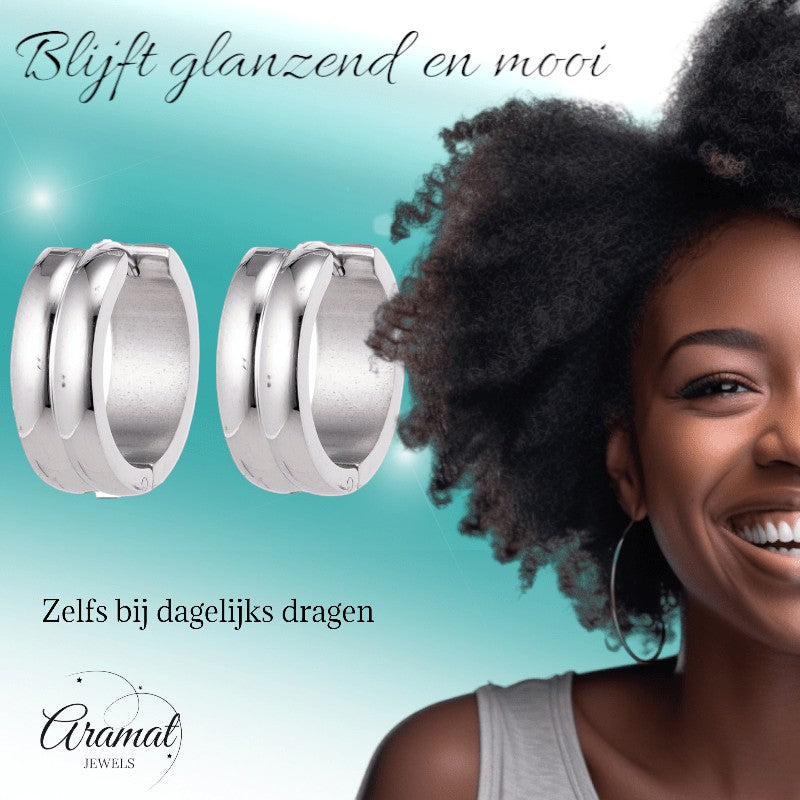 Aramat Jewels unisex silver-tone stainless steel huggie hoop earrings with double stripe detail, 20mm diameter.