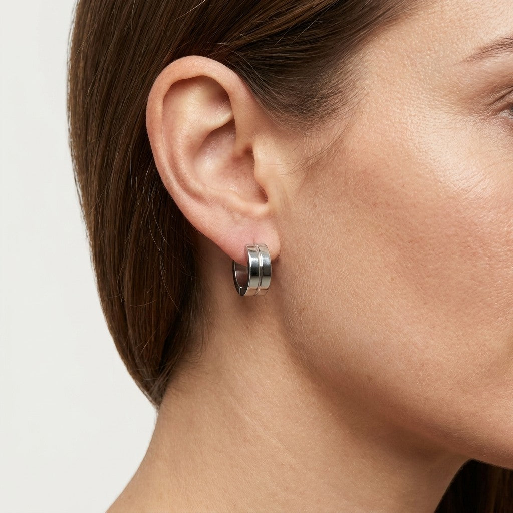 Aramat Jewels silver-tone stainless steel huggie hoop earrings with a double-band accent, 13x7mm.