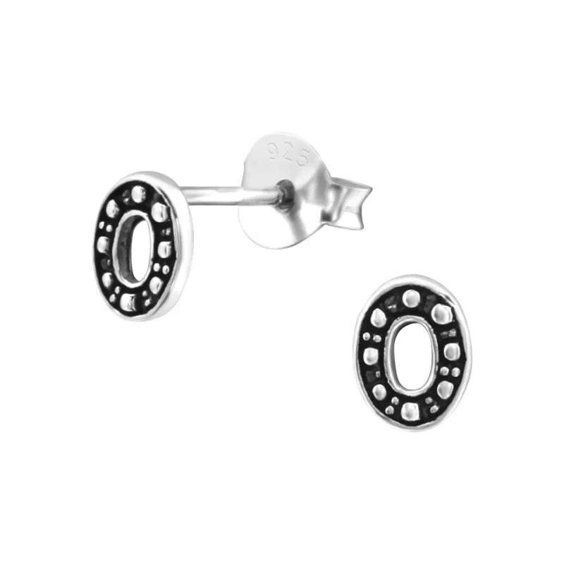 Aramat Jewels 925 sterling silver oval stud earrings with a dark Bali-style beaded pattern and open center