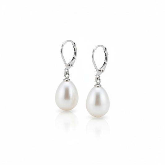 Aramat Jewels silver-tone stainless steel drop earrings featuring elegant white pearls on a white background.