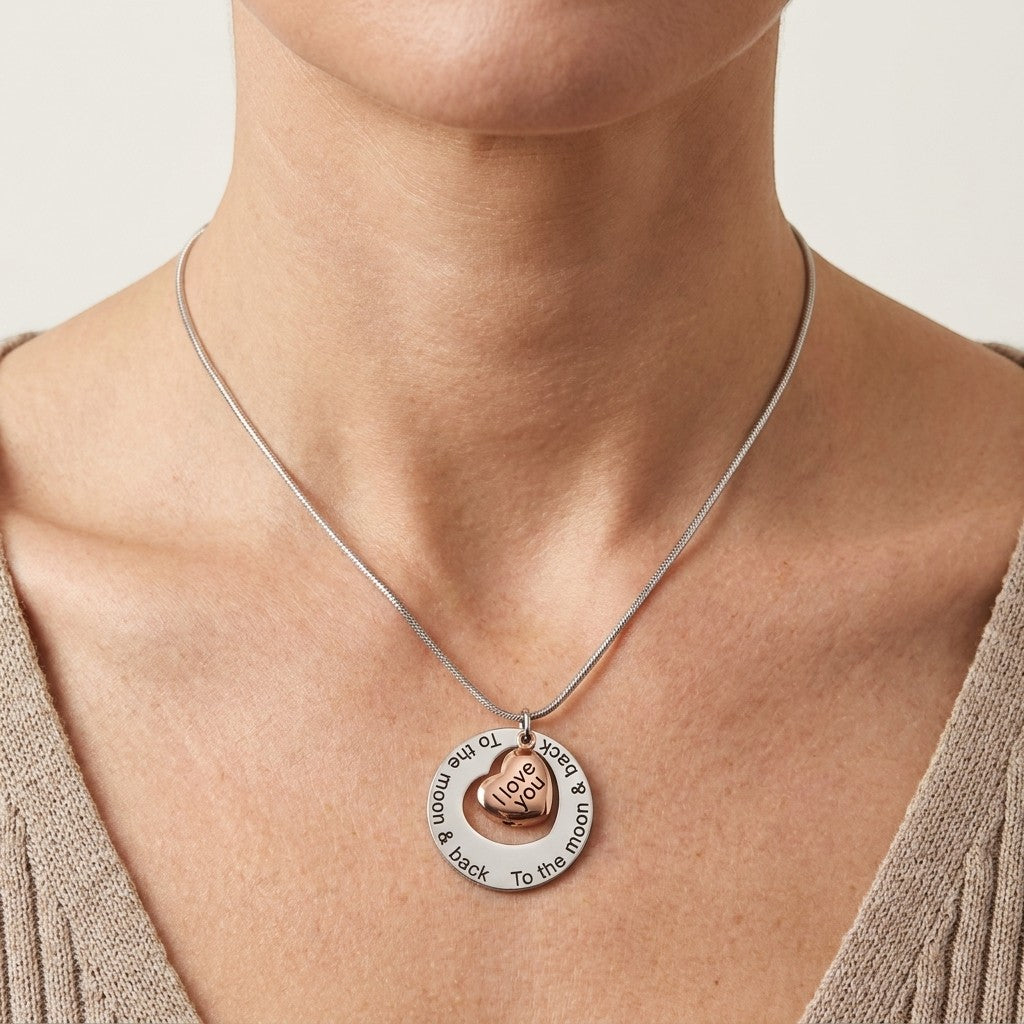 Aramat Jewels silver and rose gold pendant necklace with "I love you to the moon & back" inscription.