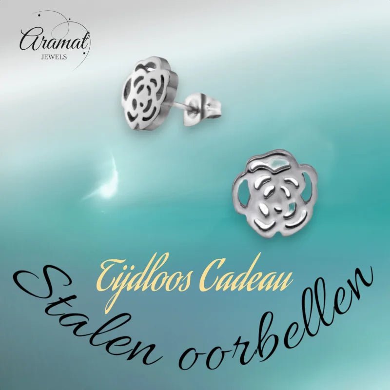 Aramat Jewels silver-colored stainless steel stud earrings featuring an elegant open-cut rose design.