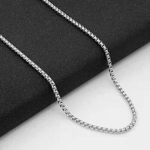 Aramat Jewels silver-colored stainless steel cable chain necklace with 3.5mm round links on a black background.