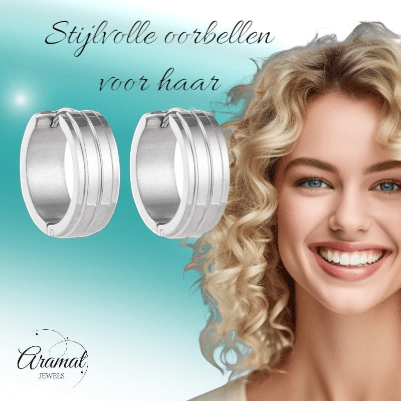 Aramat Jewels silver-tone stainless steel hoop earrings with double stripe detail, 20mm diameter.