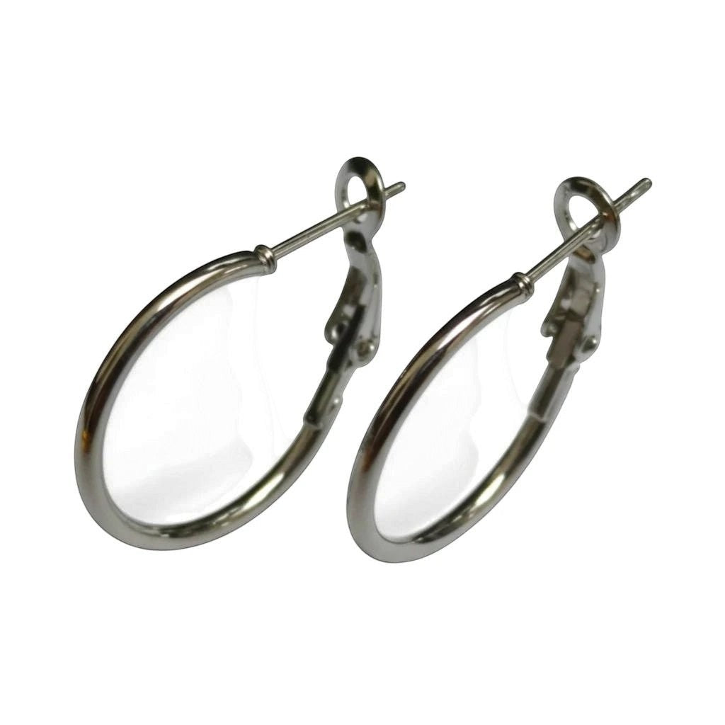 Aramat Jewels silver stainless steel hoop earrings with a high-gloss finish and hinge closure. Available in multiple sizes.