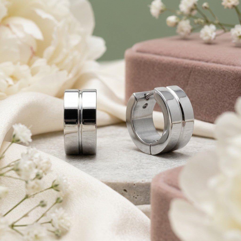Aramat Jewels silver-tone stainless steel huggie hoop earrings with a double-line accent, 13x7mm.