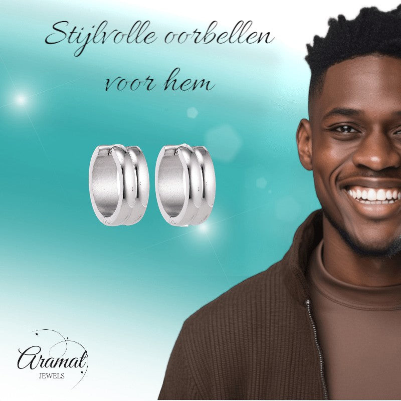 Aramat Jewels silver-tone stainless steel huggie hoop earrings with double stripe detail, 20mm diameter.